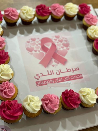 Breast cancer Awareness - 2 Dozens mini cupcakes Please keep your writing that you want on the board in the box below