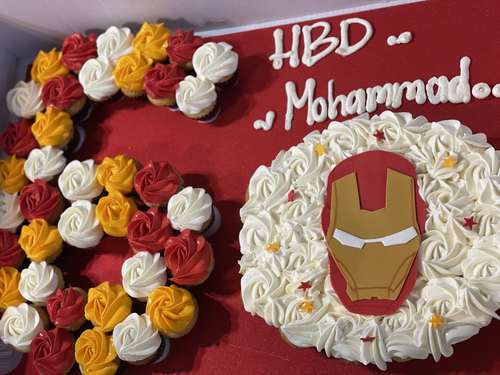 Iron man + number - 5 Dozens mini cupcakes Please keep your writing that you want on the board in the box below