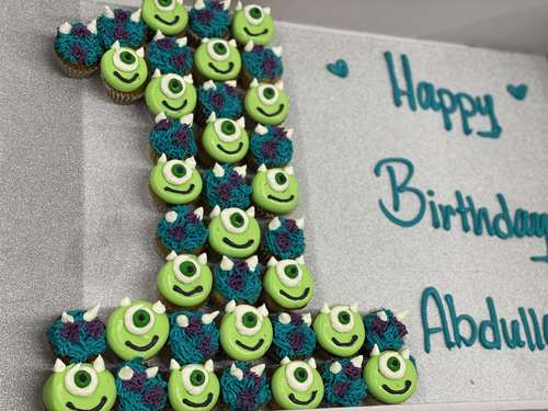 monster INC number - 3 Dozens mini cupcakes Please keep your writing that you want on the board in the box below