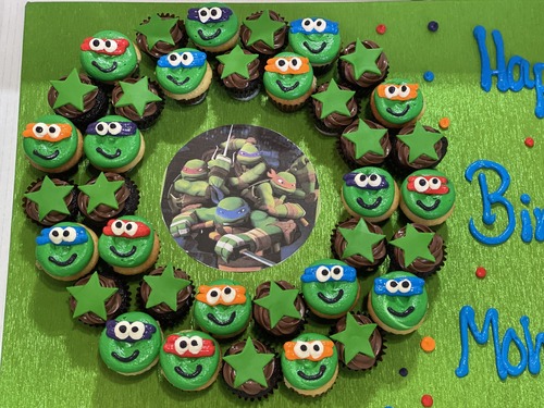 Ninja turtles - 3 Dozens mini cupcakes  Please keep your writing that you want on the board in the box belowThis Design with Chocolate Flavor and all the chocolate Flavor comes with nuts