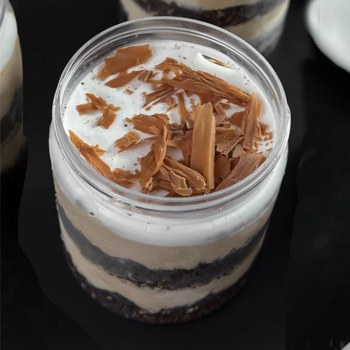 Mocha gelato jar - Mocha Gelato Jar Indulge in the perfect harmony of rich espresso and fine chocolate with our Mocha Gelato Jar. Layers of smooth mocha gelato, fudgy chocolate cake, a swirl of light Chantilly cream, all crowned with  chocolate shards. A dream dessert for coffee and chocolate lovers alike!