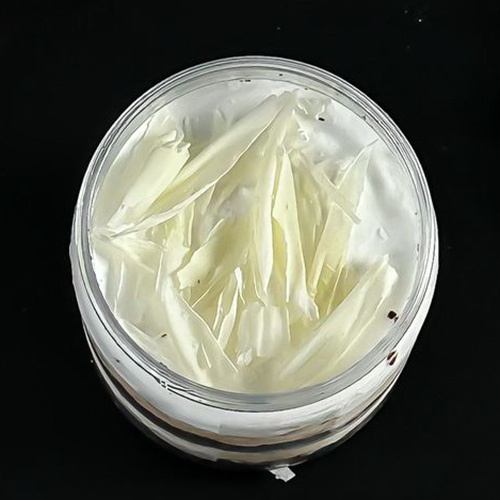 FLAT WHITE GELATO JAR - A smooth and creamy blend of espresso and steamed milk captured in our signature Flat White Gelato. Layered with moist chocolate  cake and topped with a soft cream Chantilly, then beautifully finished with delicate white chocolate flakes for a touch of elegance. A subtle, sophisticated coffee dessert in every spoon