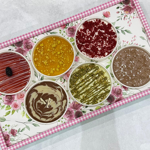 Cream Cheese Cake Bento Box - A premium selection of mini cream-cheese cakes, beautifully packed in a bento box. Perfect for gifting, celebrations, or tasting variety in one box. 
 1. Pistachio Rich pistachio cream cheese with crunch soft cake and crushed pistachio. 
 
 2. Red Velvet Classic red velvet sponge layered with silky cream-cheese frosting. 
 
 3. Chocolate flake  Moist chocolate sponge with chocolate cream cheese and chocolate crunch 
 
 4. Mango  mango cream cheese with soft sponge and mango jelly.  
 
 5. Strawberry Strawberry cream cheese and strawberry jelly on soft vanilla sponge. 
 
 6. Kinder Creamy Kinder filling blended with cheese cream and chocolate sponge.