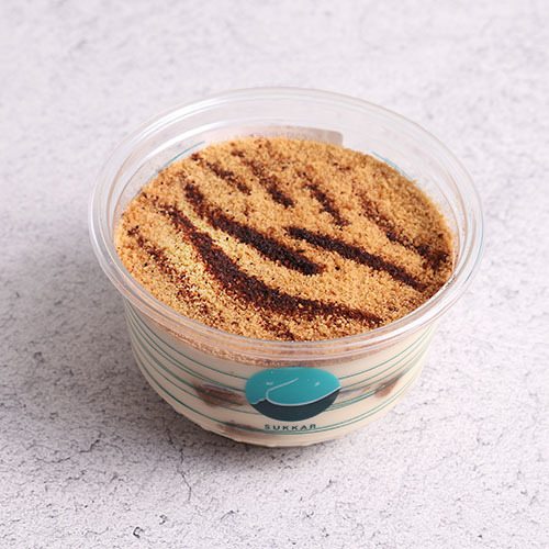 Mini Tiger - Rich layers of Sukkar cream prepared and carefully distributed with layers of espresso cake Covered w/&nbsp; layer of chocolate powder.