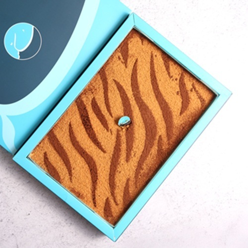 Tiger - A group of delicious espresso biscuit&nbsp; layers mixed with layers of special sukkar cream carefully prepared and distributed, and covered with a layer of cocoa powder