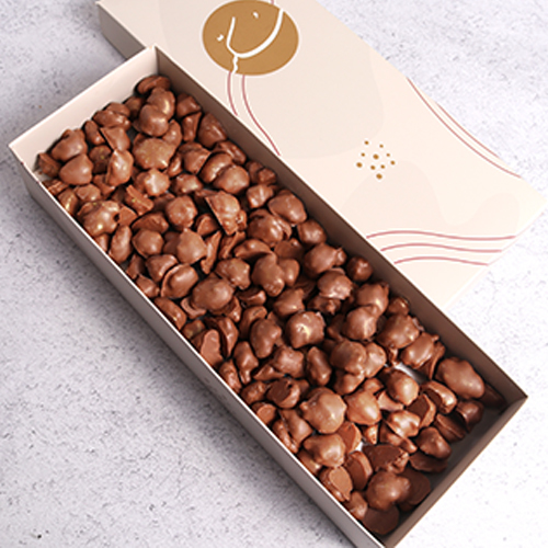 Golden Chocolate .450g - A bunch of pecan kernels and&nbsp;honey biscuits dipped&nbsp;in the chocolate&nbsp;finish with golden dust
 450&nbsp;gm