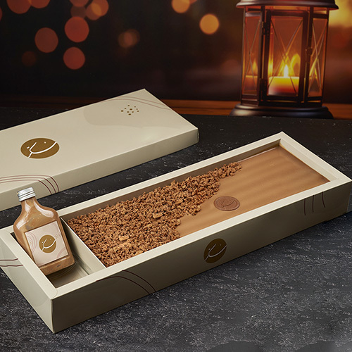 Chocolate Sea Salt Crunch Cake - Moist and rich chocolate cake layered with smooth milk chocolate ganache, sea salt caramel, and a crunchy layer combined with creamy cream cheese for an irresistible texture and flavor.