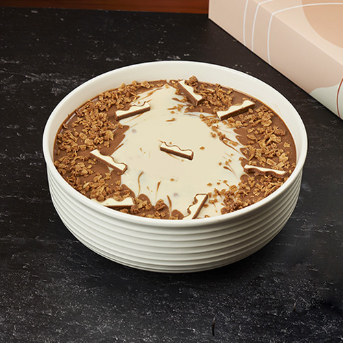 Hot Kinder Pudding - A warm and indulgent pudding layered with soft, moist cake, creamy Kinder filling, crunchy biscuit, silky milk chocolate ganache, and luscious Kinder cream for an irresistible comforting treat.