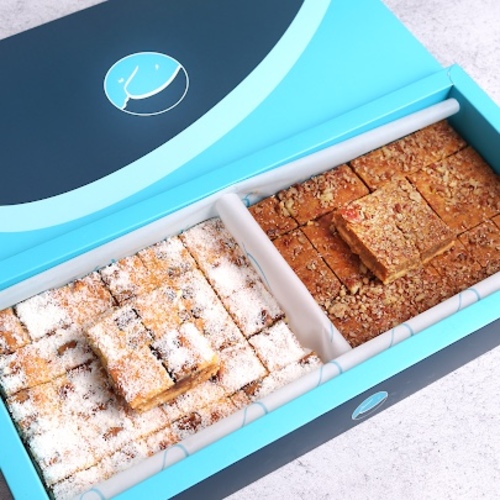 PECAN DELIGHT KINDER BITES - A box of our special products consisting of &nbsp; 2 flavors mixed with oriental cheese and biscuits, pecan , dates, and kinder with coconut
68&nbsp;piece