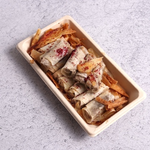 Mini Mosakan - Small box
containing 12 pieces of musakhan rolls stuffed with chicken and sumac on the
Jordanian way