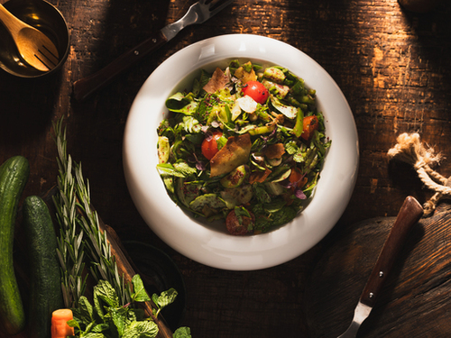 FATTOUSH AL BABA - baby fresh vegetables of rocca,mint,lettuce,zaatar,cherry tomato mixed with olive oil, lemon,agred balsamic topped with grilled smoked bread and summac