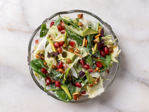 Mayar Restaurant - Maria Salad - Mixtures of Fresh leaves with Mayar Dressing topped with fresh sliced of Avocado & caramelized walnuts,pine seeds & pomegranate seeds.