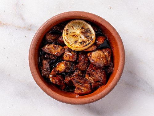 Mayar Restaurant - Chicken Liver with Pomegranate Sauce - Fresh Chicken Liver Fried with Butter and Spices and Pomegranate Sauce.