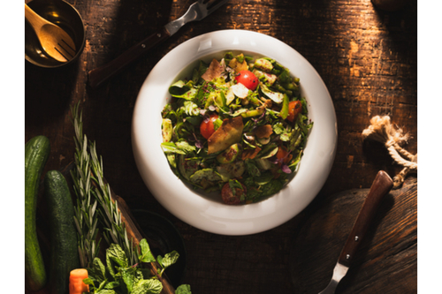 FATTOUSH AL BABA - baby fresh vegetables of rocca,mint,lettuce,zaatar,cherry tomato mixed with olive oil, lemon,agred balsamic topped with grilled smoked bread and summac