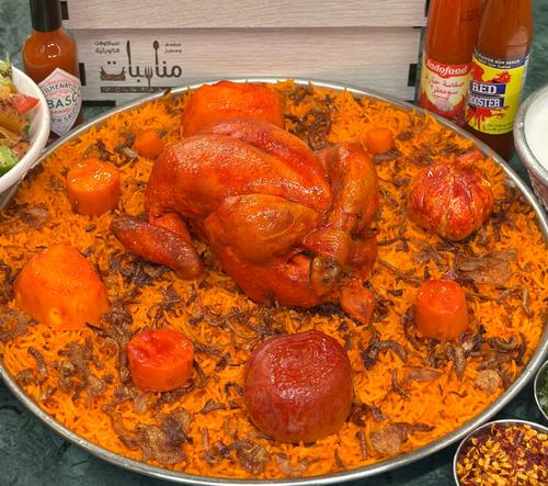 Stuffed chicken with red kabsa