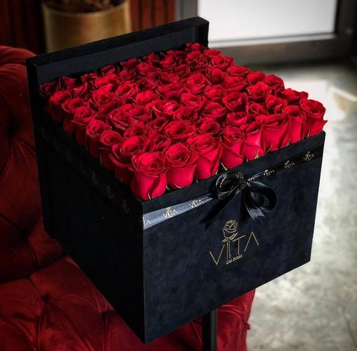 blacky no - black box contains red roses