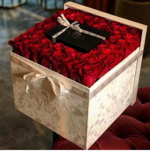 whitey - white box contains white box and red roses