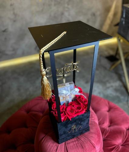 Black Gradu - black box contains red roses and middle ,money box with graduations hat 
 Note: you can add the money amount or you can take the box empty