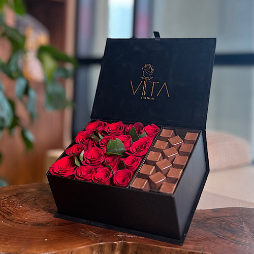 Infinite - This black box contains red roses with green leaves. Comes with chocolates.