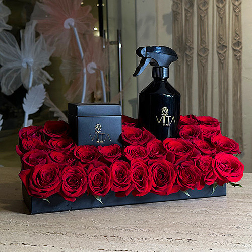 Spring - A black tray contains red roses, 300 ml spray perfume with a box of chocolates. H : 25 W : 30