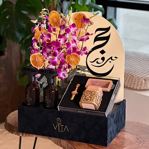 Shaikha - Black box contains purple baby orchid, dried fruit, with 2 spray perfume with package containing mubkhar, charcoal handle and box for bakhour. Height: 65 Width: 40
