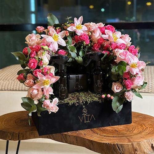 prem - black box contains, pink roses pink  baby roses ,fuchsia estoma pink  green leaves and box of chocolate and 2 spray perfume  
 Height: 65 Width: 40