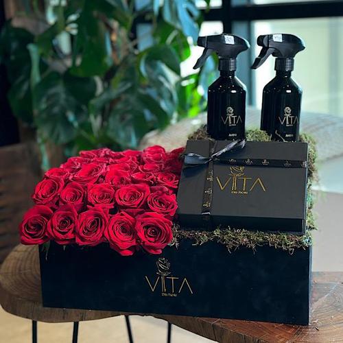 jishan - Black  box contains red roses and  300 grams of chocolate and 2 spray perfume. Height: 40 Width: 40