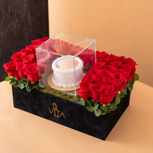 Karla - This black box contains red roses with a cake. Height: 35 Width: 40