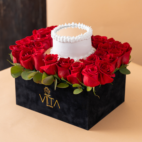 Julie - This black box contains red roses with a cake. Height: 25 Width: 20