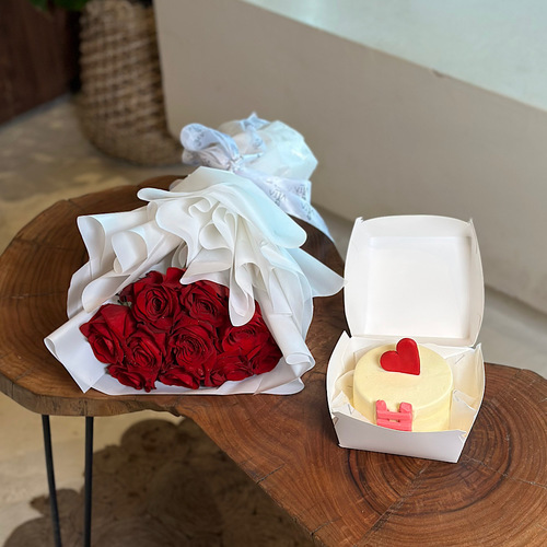 With You 143 - Hand bouquet that contains red roses with white wrapping and a love day cake. Height: 45 Width: 20