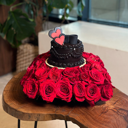 Adoring - Black base contains red roses with a black Valentine's cake. Height: 30 Width: 25