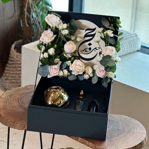 Blessing - Black box contains white roses white baby roses green leaves with 250 ml diffuse with hajj stand Height: 45 Width: 35