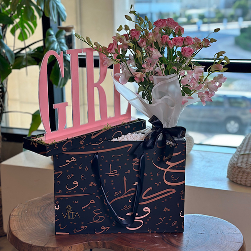 The volume - Black tray box containing pink baby roses pink baby orchid with new baby born stand for girls  Height: 65 Width: 40