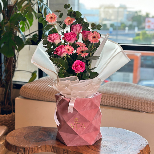 Unless - Pink box contains pink roses , pink grabera green leaves  Height: 70  Width: 40