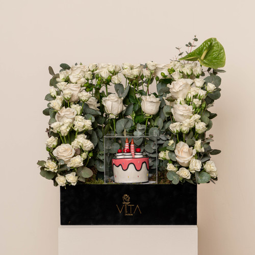 seco - black box contains white roses white baby roses green leaves with cake 
 H 70 cm 
 W: 40