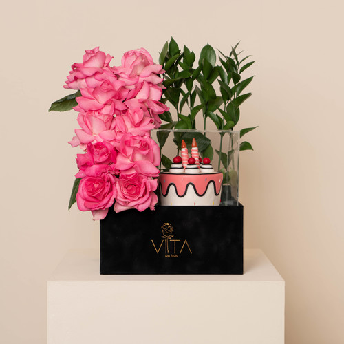 The Ecra - A black box contains pink roses, and green leaves with cake. H 60 cm 
 W : 40 cm