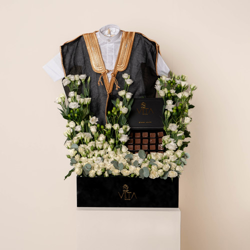 The bisht - Black box contains white baby roses , green leave , green hypericum with box of chocolate and new baby born deshdasha and bisht Height: 60 Width: 50