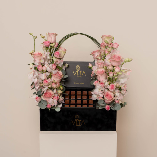 The last - Black box contains pink roses pink baby orchid green leaves with box of chocolate Height: 50 Width: 40