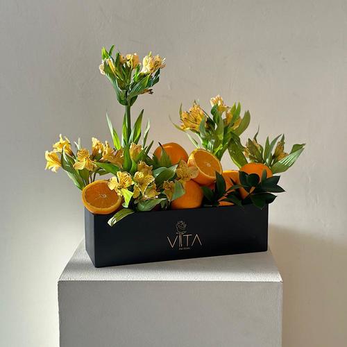 Dacia - This box contains alstromeria  green leaves with fresh orange. Height: 50  Width: 40