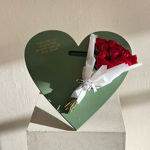 Sunshine - A heart-shaped box filled with red roses, perfect for gifts and special occasions, adding a touch of elegance and romance. Height: 40  Width: 50