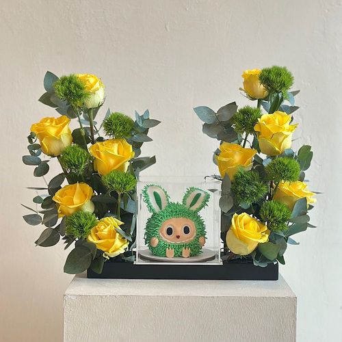 Ilfov - A tray elegantly filled with yellow rose and dianthus green leaves with a cake. Height: 50 Width: 20