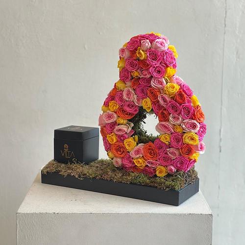 voko - A tray elegantly filled with pink, yellow, pink and fuchsia baby roses with box of chocolates 
 H: 50 w : 30