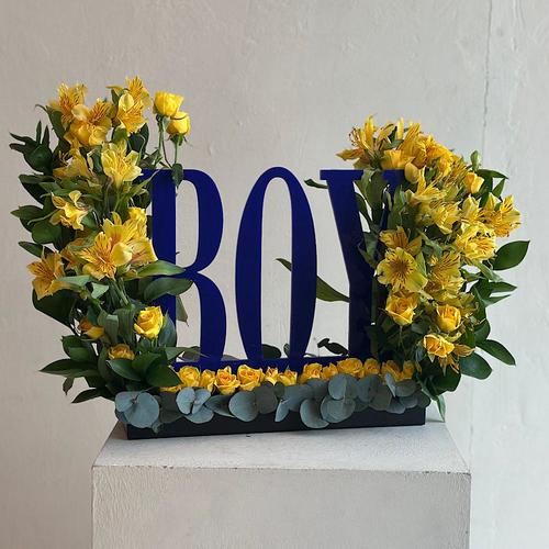 Ocean - A tray elegantly filled with  baby roses yellow  astomeriya yellow , an acrylic stand for a boy new born. Height: 45 Width: 30