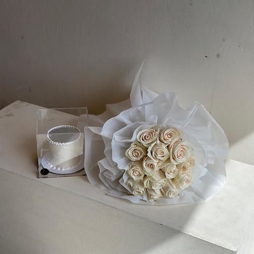 moss - hand bouquet contains white roses with white wrapping and mirror cake   Height: 65 cm Width: 35 cm