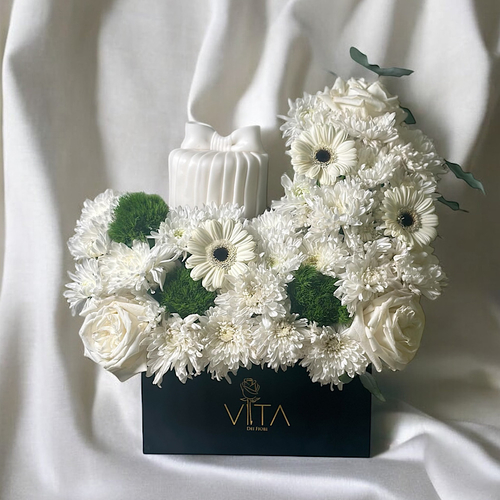 Braga - A bouquet containing roses, gerberas, and chrysanthemums, arranged beautifully in a box with a cake. Height: 35 cm Width: 20 cm