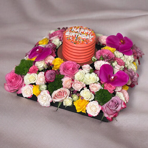 Mainz - A black base that contains deep purple roses, yellow roses, pink roses, green stick, cut flowers , baby roses and leaves, comes with a cake Height: 30 Width: 40