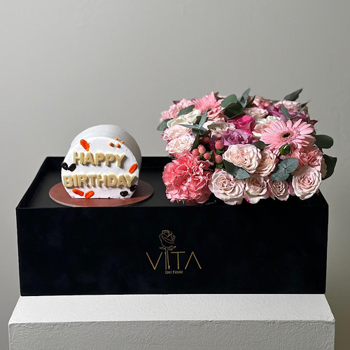 Glamorous - A black box that contains deep purple roses, gerberas, pink carnations and baby roses, hypericum and eucalyptus leaves. comes with a cake Height: 30 Width: 40