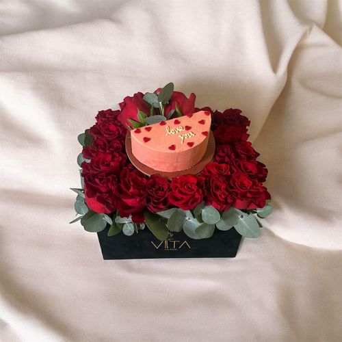 Solin - black box contains red roses and green leaves with middle cake&nbsp; Height: 25 Width: 20