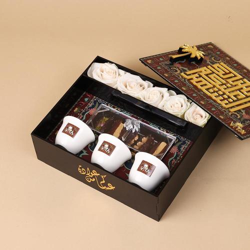 Mini Holy Month - Box containing white roses , 3 pcs coffee cups and dates&nbsp; Height: 18  Width: 25