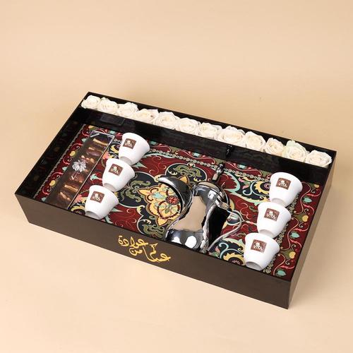The Holy Month - Box containing white roses with arabic coffee dallah , dates 6 coffee cups Height: 18 Width: 65